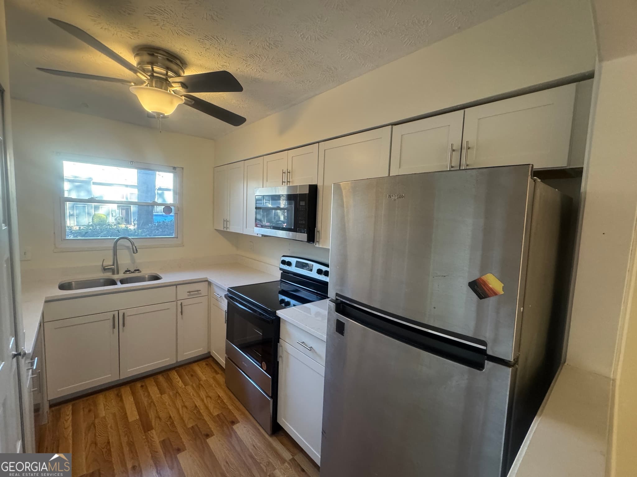 3 bedroom, 2.5 bathroom, 1,492 sq ft condominium for sale at 3563 Splinterwood Road, Peachtree Corners, GA 30092 — photo 2