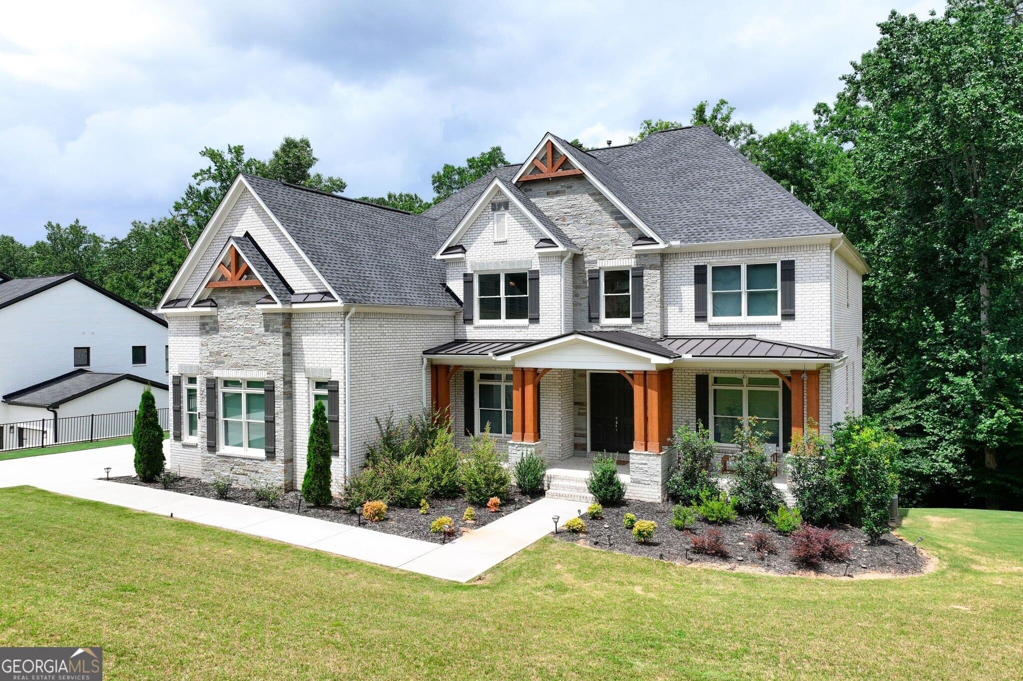 5 bedroom, 5.5 bathroom, 4,692 sq ft single family residence for sale at 14180 Reserve Manor Lane, Roswell, GA 30075 — photo 2