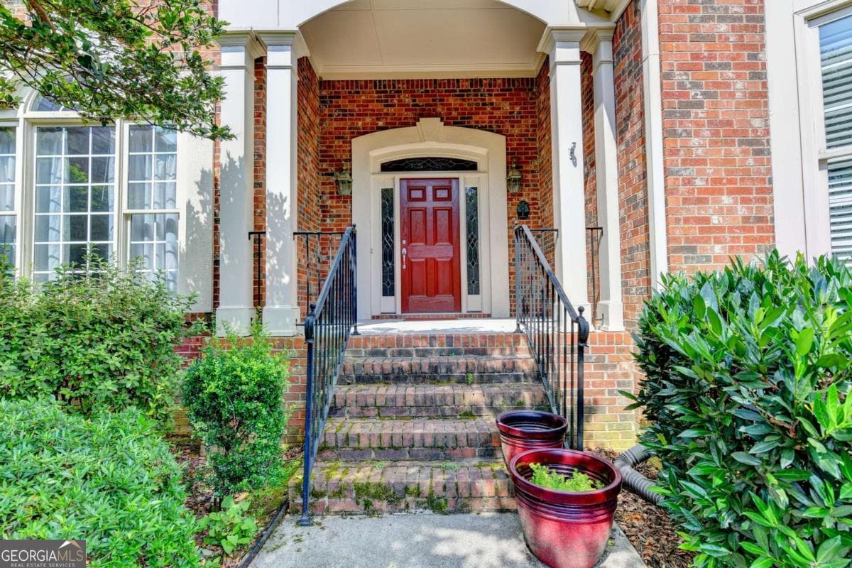 4 bedroom, 3.5 bathroom, 2,309 sq ft single family residence for sale at 1672 WOODBOW Crossing, Dacula, GA 30019 — photo 2