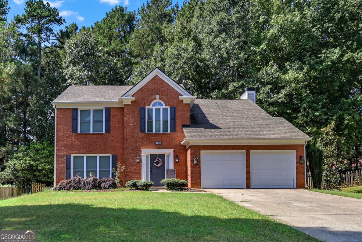 4 bedroom, 2.5 bathroom, 2,232 sq ft single family residence for sale at 1934 McLennon Court, Lawrenceville, GA 30043 — photo 2