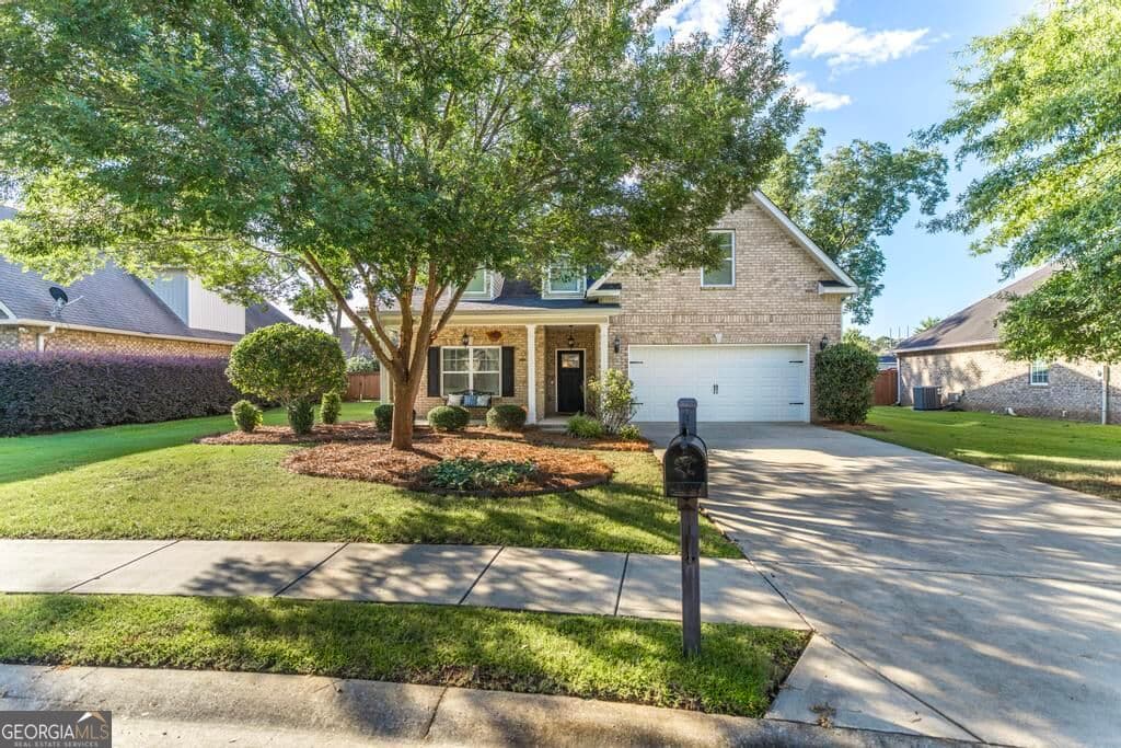 5 bedroom, 3 bathroom, 2,748 sq ft single family residence for sale at 207 Red Hawk Point, Kathleen, GA 31047 — photo 2