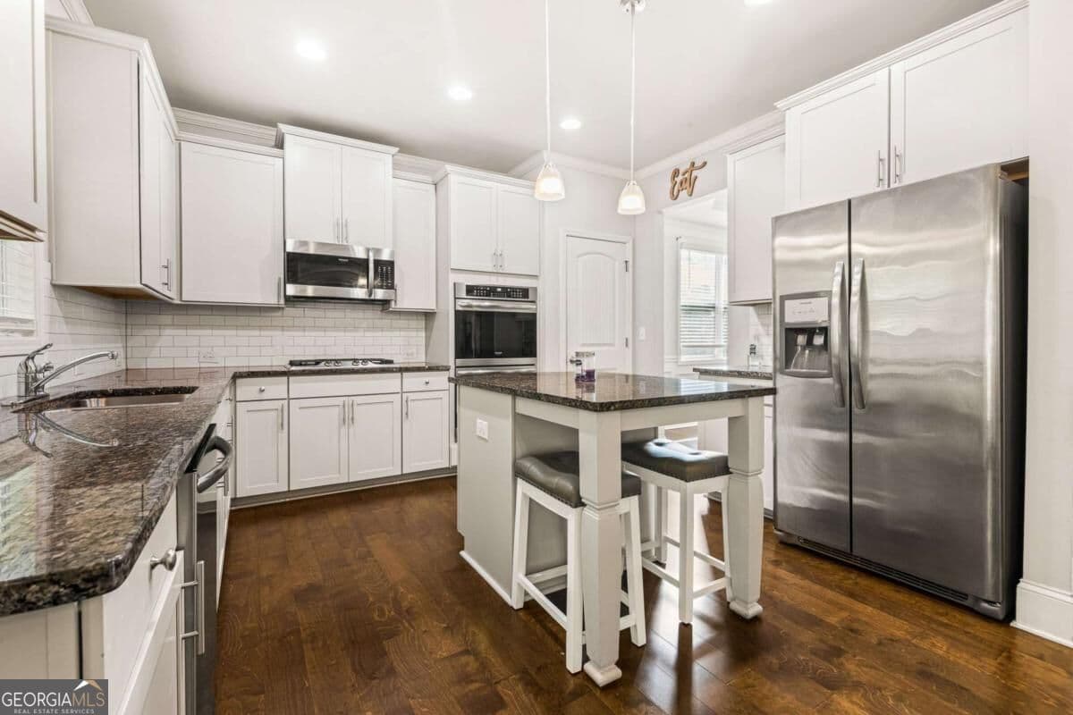4 bedroom, 2.5 bathroom, 2,988 sq ft single family residence for sale at 5370 Silver Woods Walk, Powder Springs, GA 30127 — photo 6