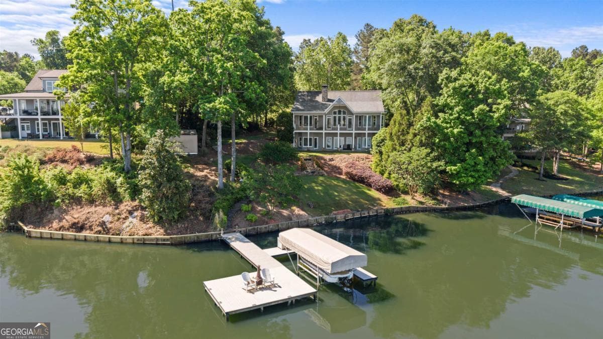 4 bedroom, 4.5 bathroom, 3,767 sq ft single family residence for sale at 1891 Northwoods Drive, Greensboro, GA 30642 — photo 2