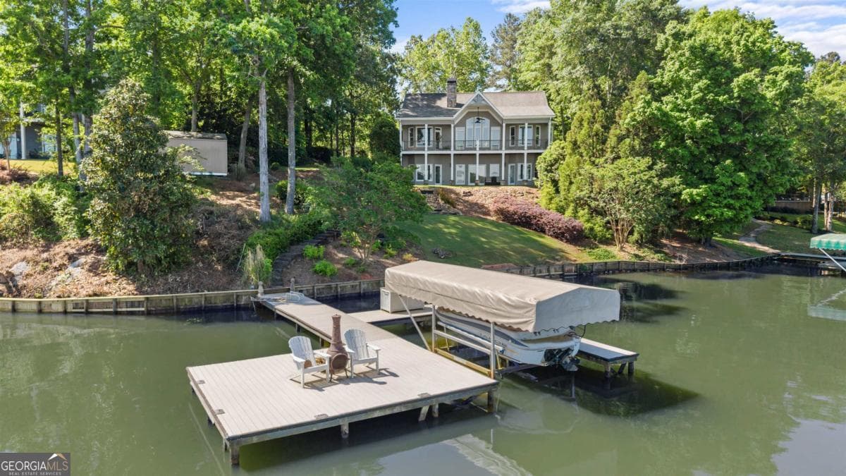4 bedroom, 4.5 bathroom, 3,767 sq ft single family residence for sale at 1891 Northwoods Drive, Greensboro, GA 30642 — photo 6