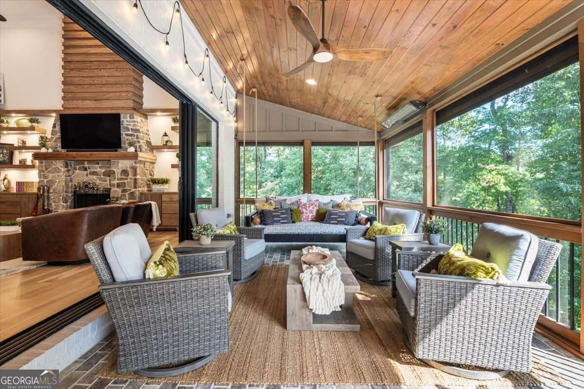 4 bedroom, 4.5 bathroom, 5,577 sq ft single family residence for sale at 5750 Cains Cove Road, Cumming, GA 30041 — photo 3
