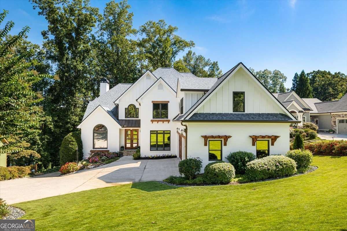 4 bedroom, 4.5 bathroom, 5,577 sq ft single family residence for sale at 5750 Cains Cove Road, Cumming, GA 30041