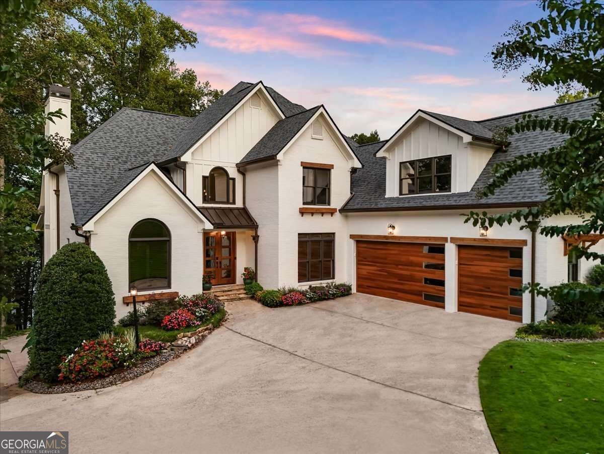 4 bedroom, 4.5 bathroom, 5,577 sq ft single family residence for sale at 5750 Cains Cove Road, Cumming, GA 30041 — photo 5