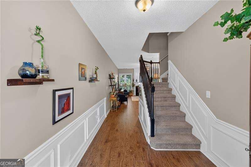 3 bedroom, 2.5 bathroom, 1,776 sq ft townhouse for sale at 151 Regent Place, Woodstock, GA 30188 — photo 1 of 28