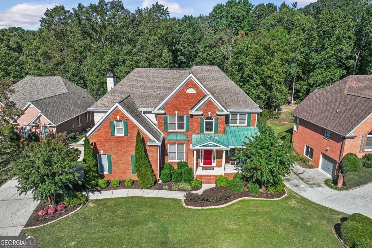 7 bedroom, 5 bathroom, 5,645 sq ft single family residence for sale at 3415 Greenside Court, Dacula, GA 30019 — photo 2