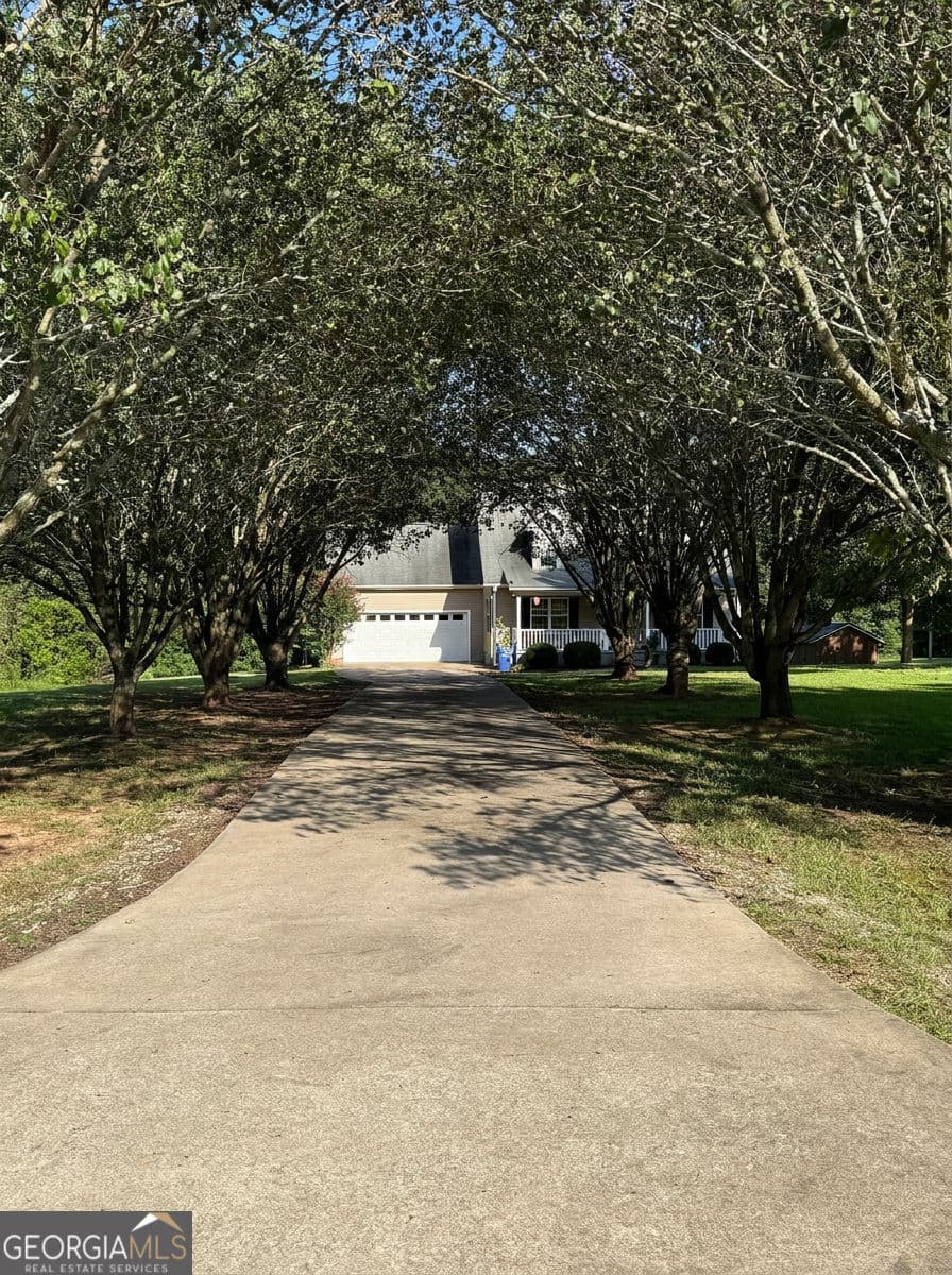 3 bedroom, 2.5 bathroom, 2,398 sq ft single family residence for sale at 1986 Hewell Road, Dewy Rose, GA 30634 — photo 6