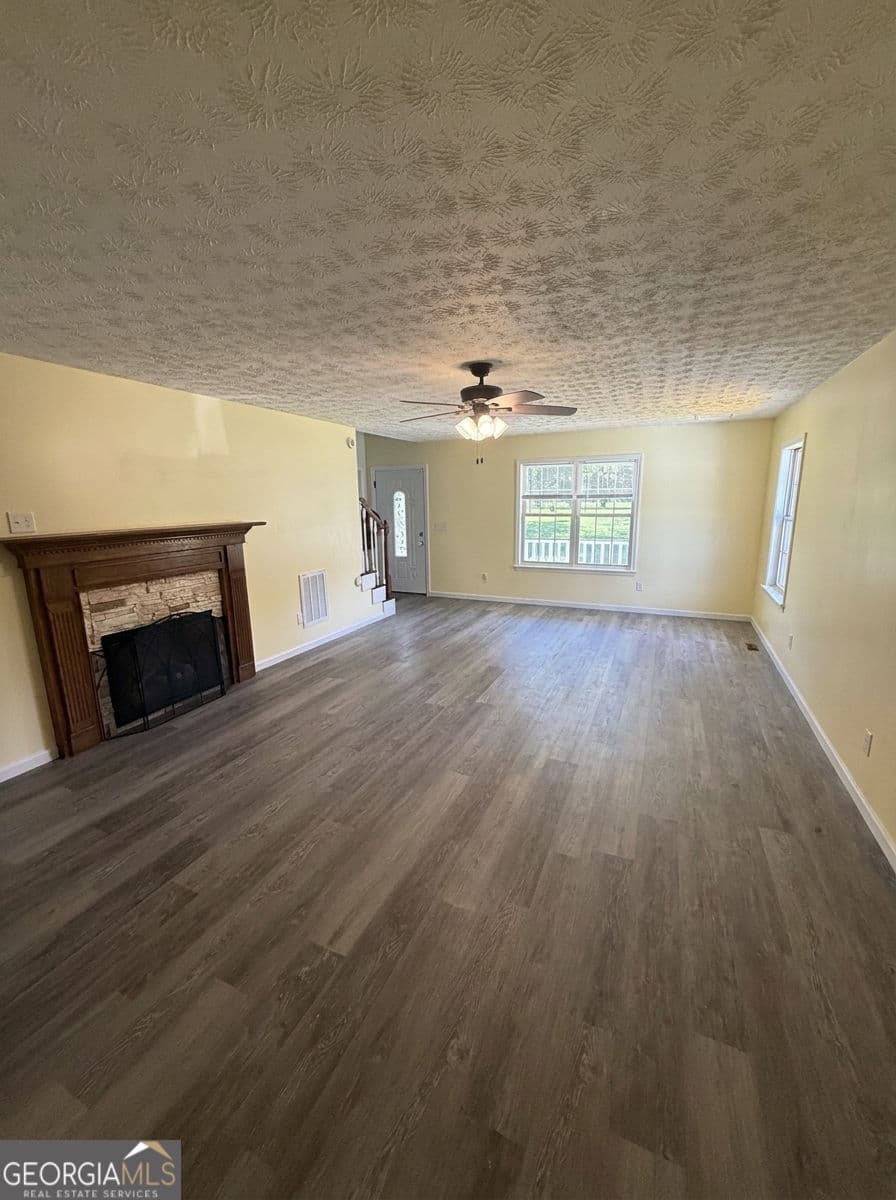 3 bedroom, 2.5 bathroom, 2,398 sq ft single family residence for sale at 1986 Hewell Road, Dewy Rose, GA 30634 — photo 7