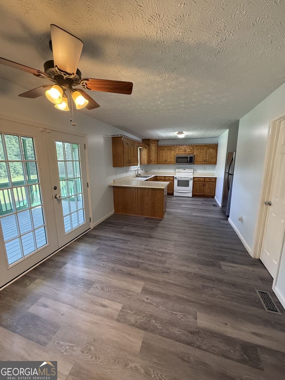 3 bedroom, 2.5 bathroom, 2,398 sq ft single family residence for sale at 1986 Hewell Road, Dewy Rose, GA 30634 — photo 9