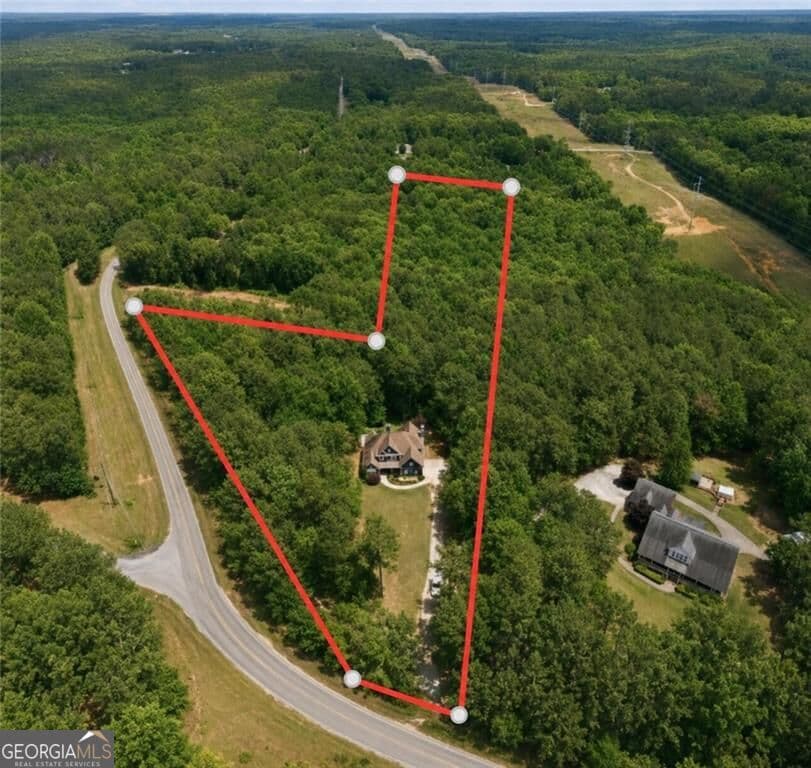 5 bedroom, 3.5 bathroom, 5,404 sq ft single family residence for sale at 12 N Alexander Creek Road, Newnan, GA 30263 — photo 1 of 44
