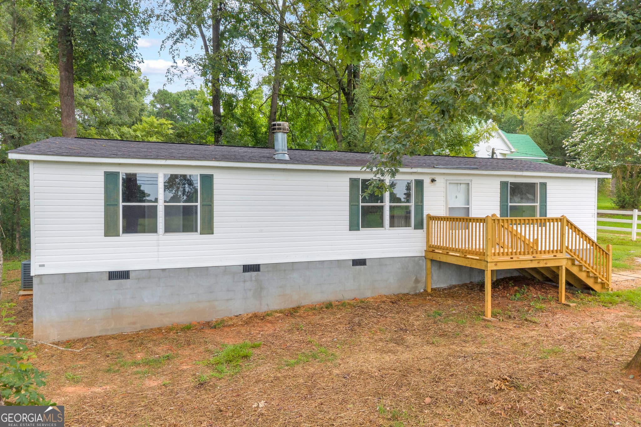 3 bedroom, 2 bathroom, 1,297 sq ft manufactured home,single family residence for sale at 218 Gainesville Street, Carnesville, GA 30521 — photo 2