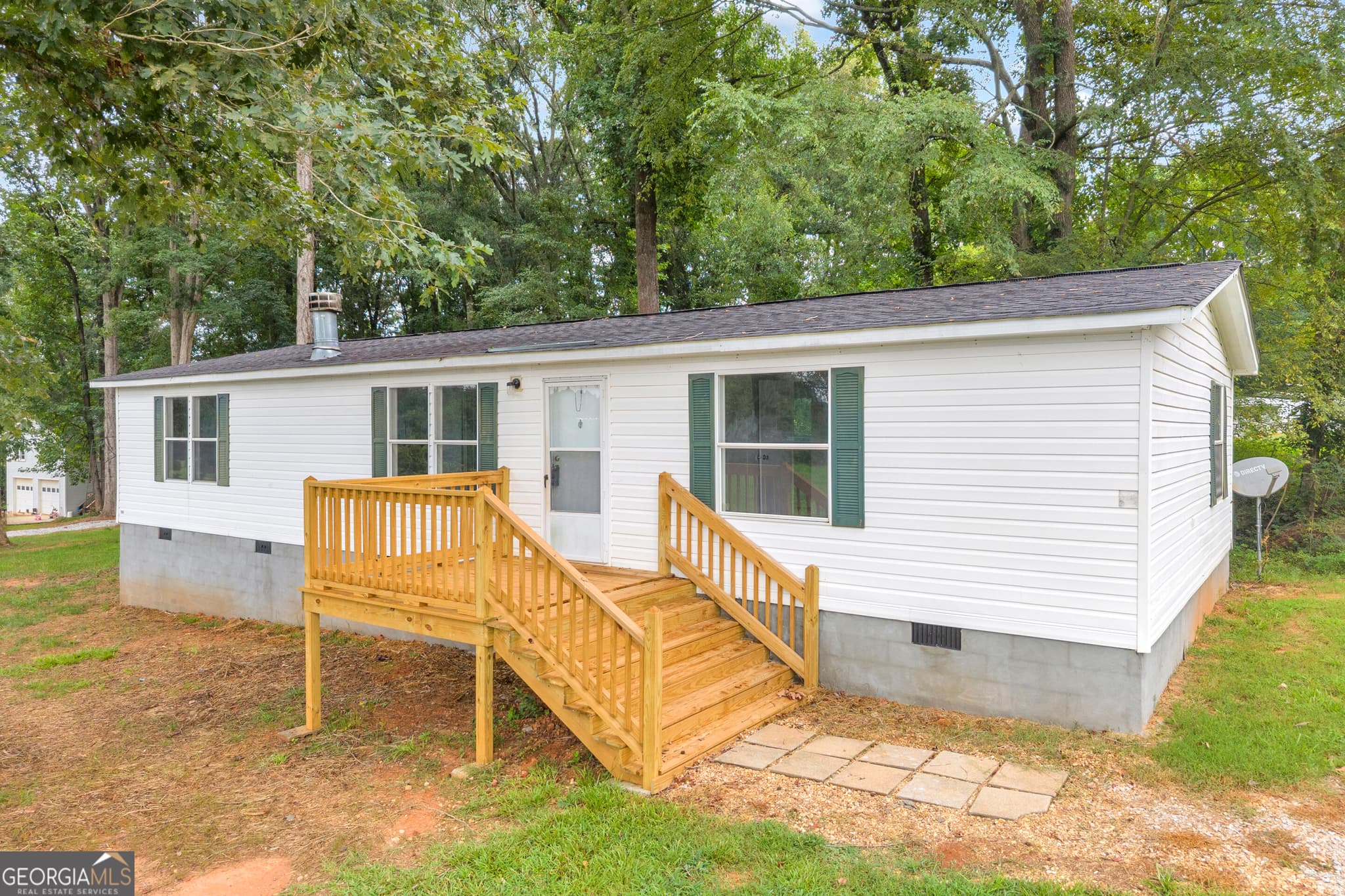 3 bedroom, 2 bathroom, 1,297 sq ft manufactured home,single family residence for sale at 218 Gainesville Street, Carnesville, GA 30521 — photo 6