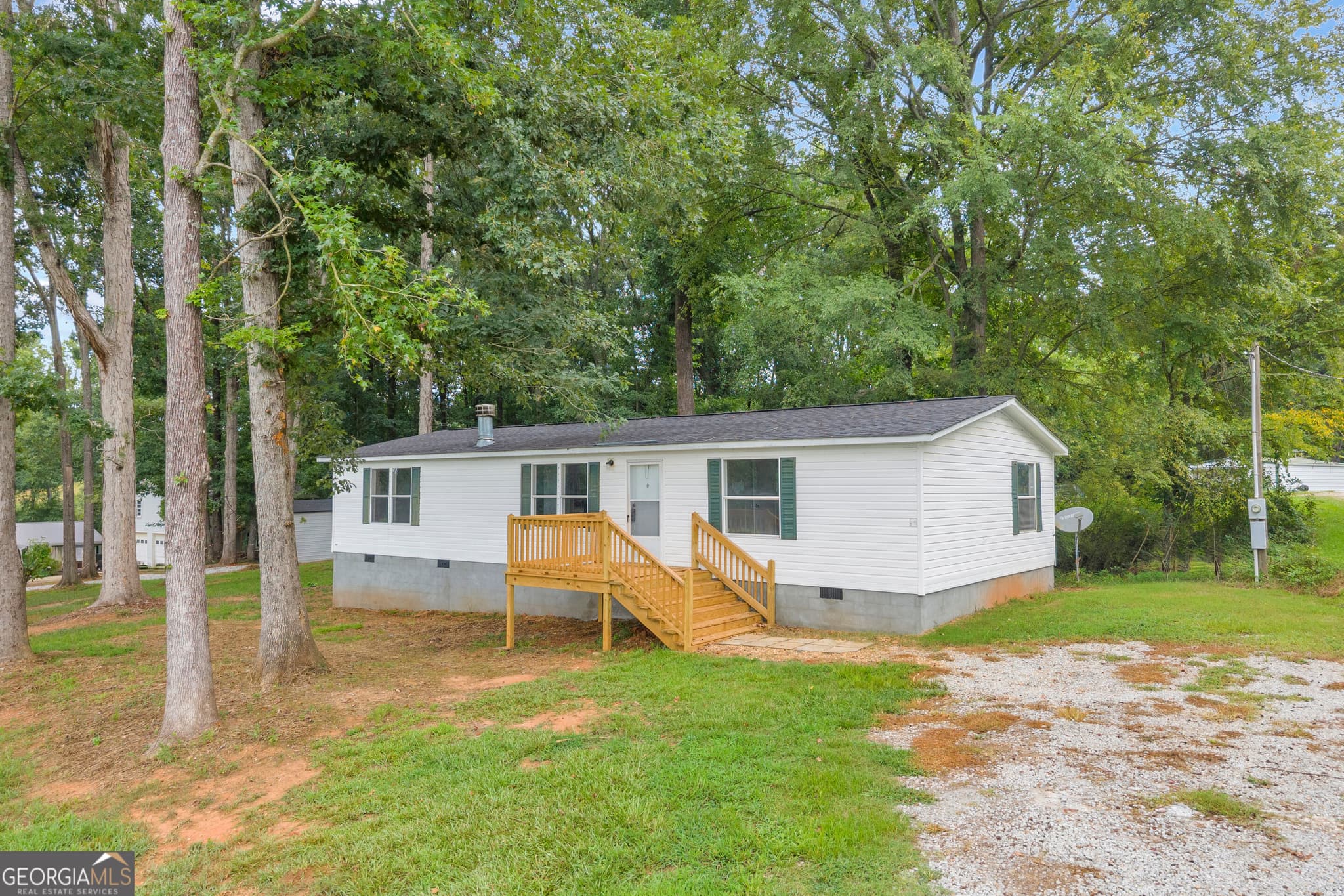 3 bedroom, 2 bathroom, 1,297 sq ft manufactured home,single family residence for sale at 218 Gainesville Street, Carnesville, GA 30521 — photo 3