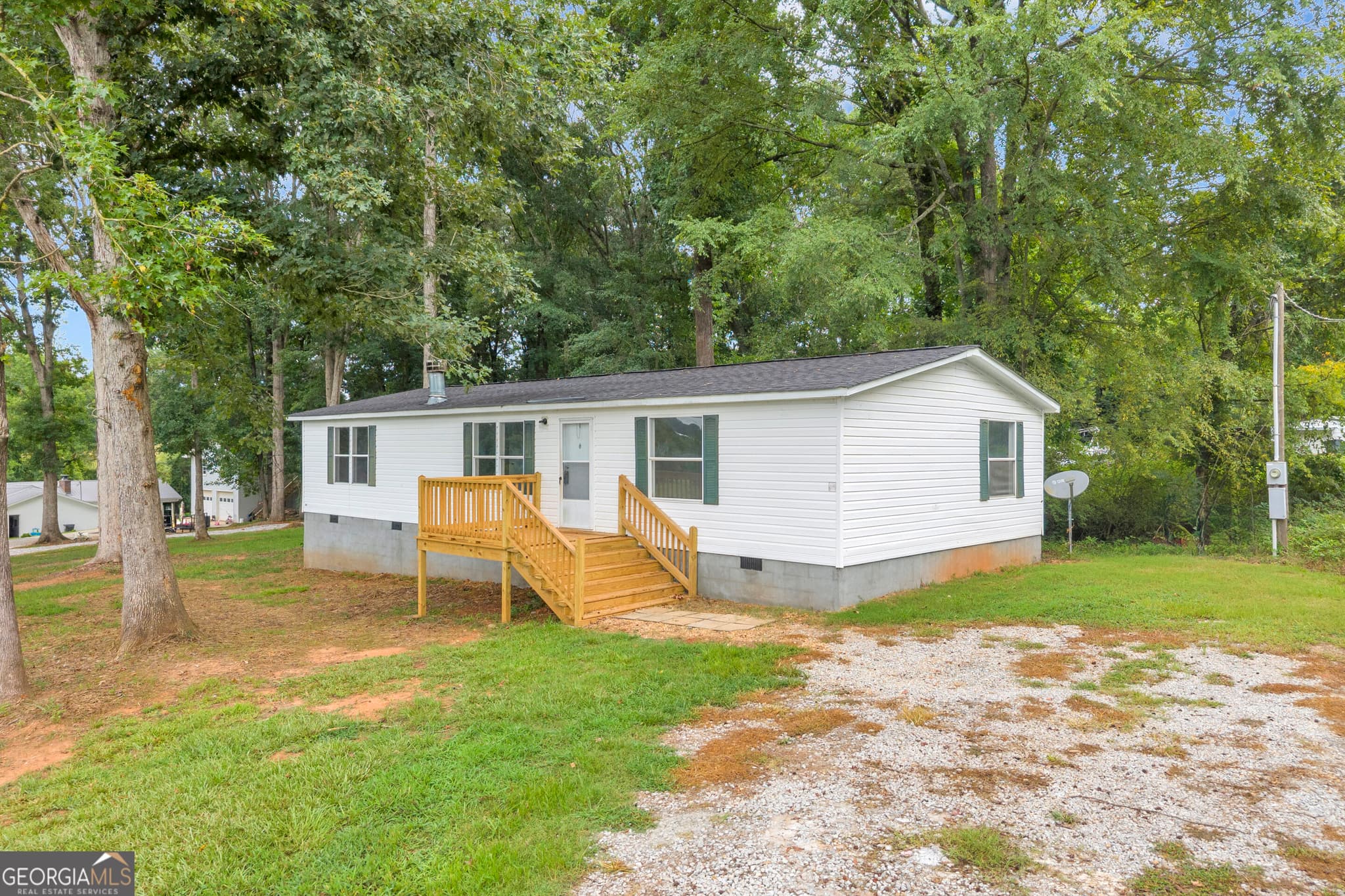 3 bedroom, 2 bathroom, 1,297 sq ft manufactured home,single family residence for sale at 218 Gainesville Street, Carnesville, GA 30521 — photo 5