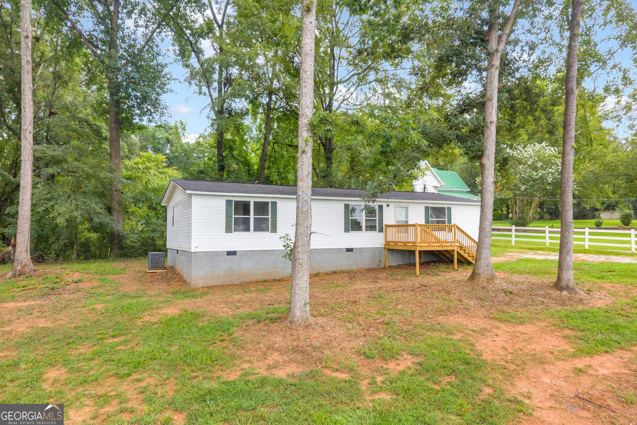 3 bedroom, 2 bathroom, 1,297 sq ft manufactured home,single family residence for sale at 218 Gainesville Street, Carnesville, GA 30521 — photo 4