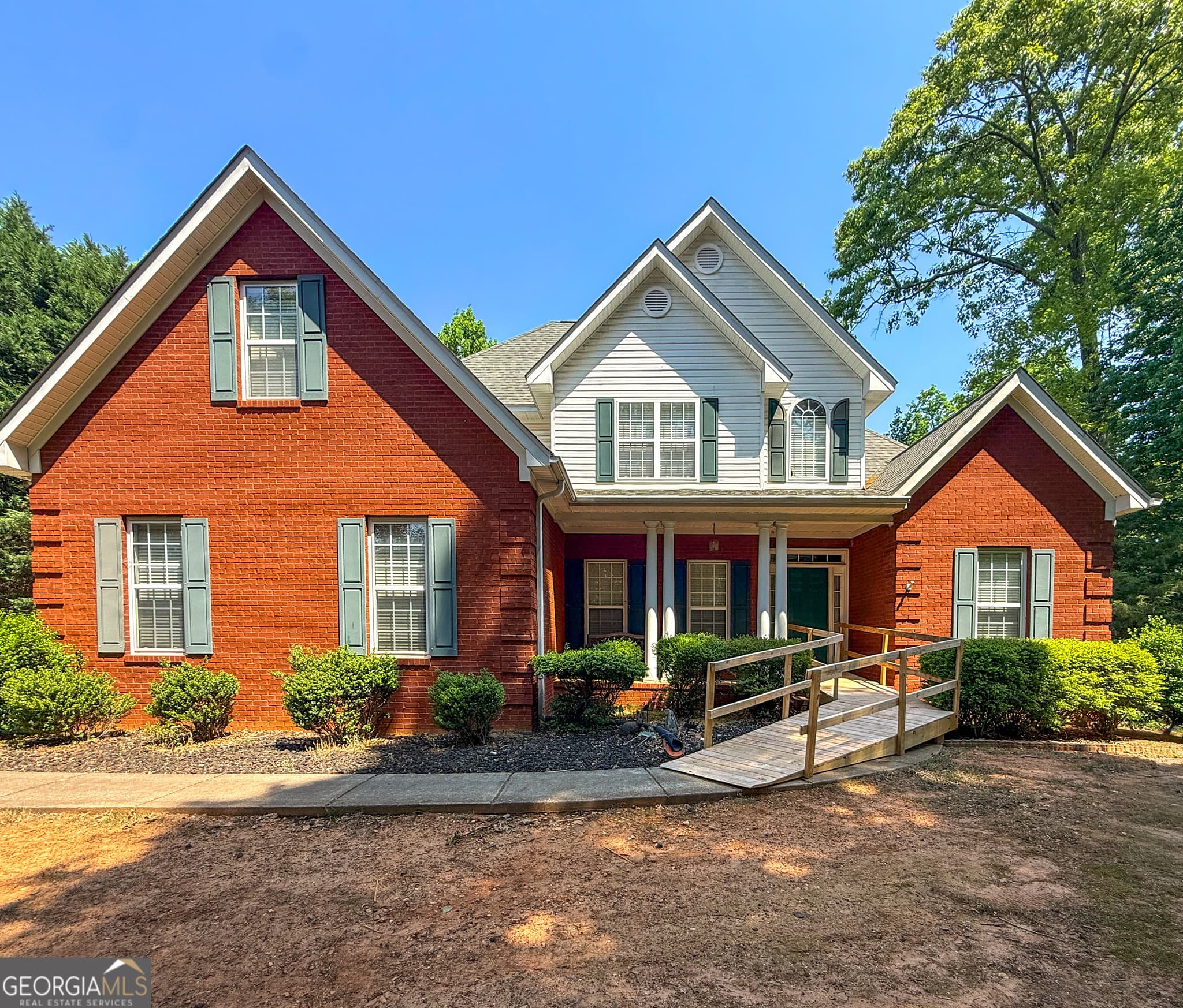 4 bedroom, 2.5 bathroom, 3,838 sq ft single family residence for sale at 1020 Bench Mark Drive, Mcdonough, GA 30252 — photo 1 of 4