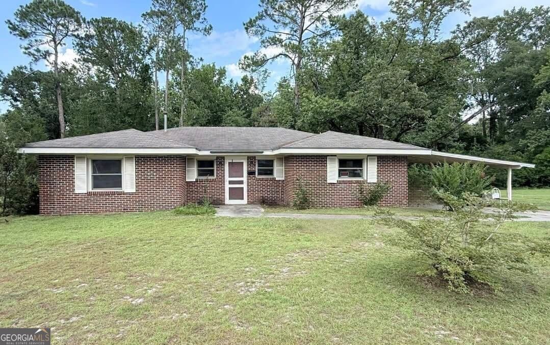 3 bedroom, 1.5 bathroom, 1,401 sq ft single family residence sold at 501 N Clark Street, Claxton, GA 30417