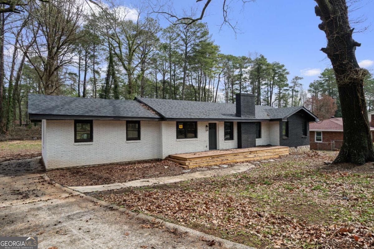 3 bedroom, 2 bathroom, 1,339 sq ft single family residence for sale at 1971 Honeysuckle Lane, Atlanta, GA 30311 — photo 3