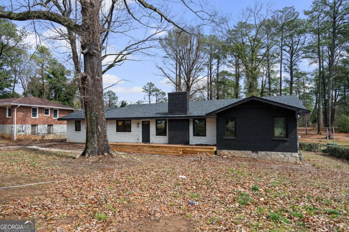 3 bedroom, 2 bathroom, 1,339 sq ft single family residence for sale at 1971 Honeysuckle Lane, Atlanta, GA 30311