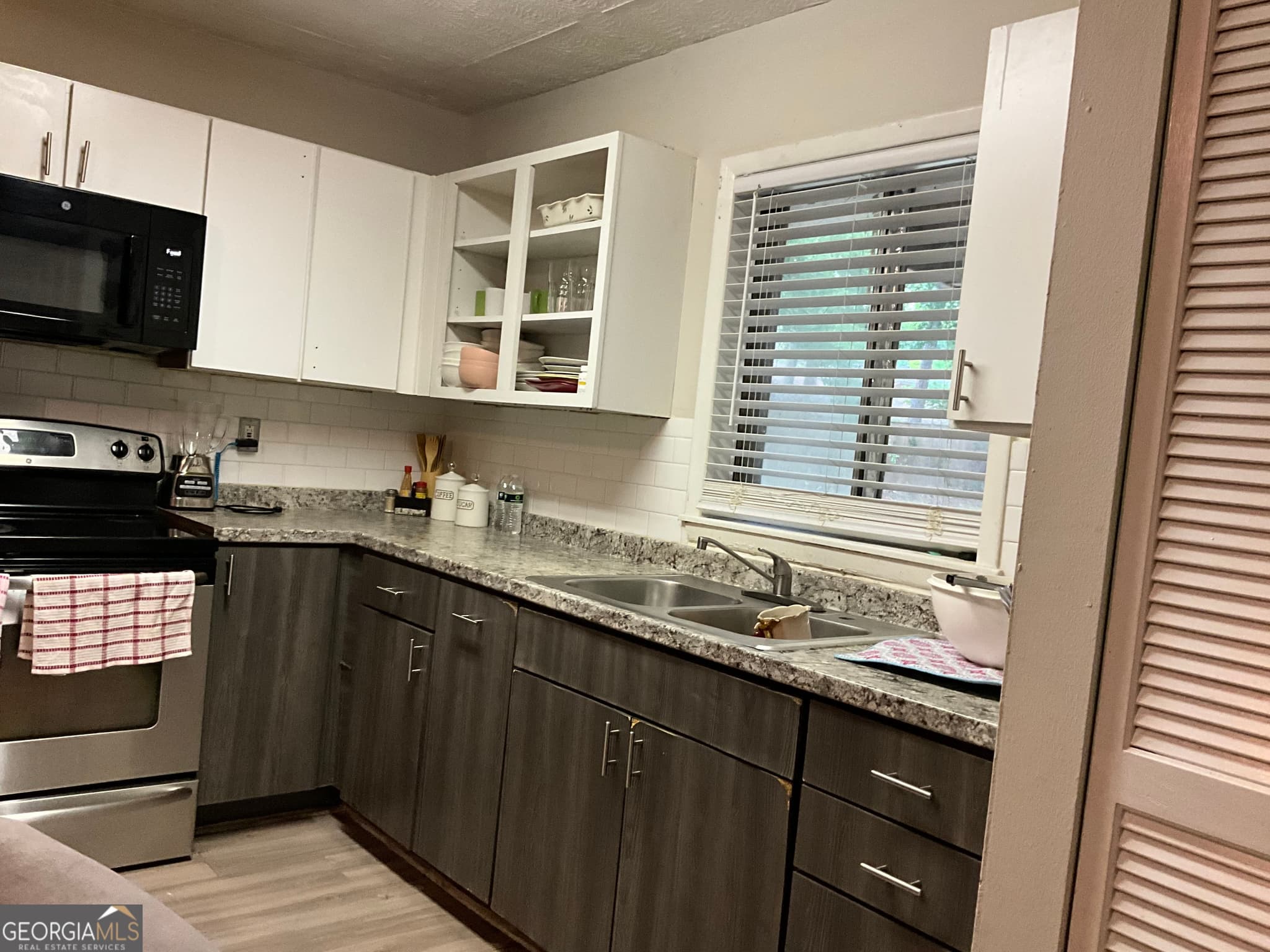 3 bedroom, 2 bathroom single family residence for sale at 6146 Hickory Drive, Forest Park, GA 30297 — photo 7