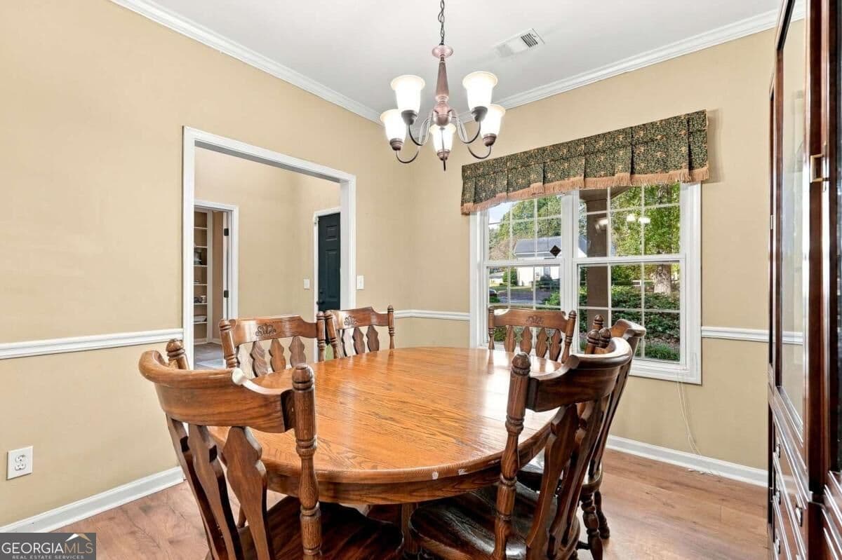 4 bedroom, 3 bathroom, 2,454 sq ft single family residence for sale at 7620 Lanier View Ridge, Cumming, GA 30041 — photo 8