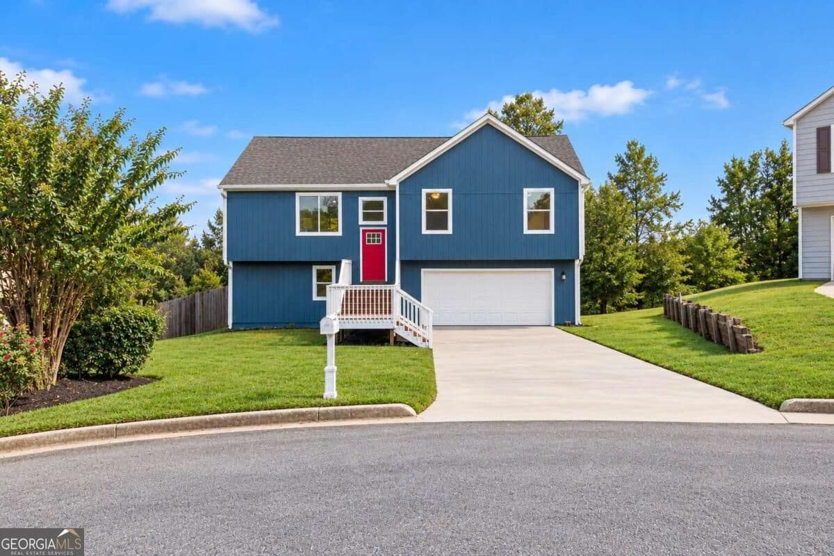 4 bedroom, 3 bathroom, 1,958 sq ft single family residence for sale at 590 Pinnacle Point, Lithonia, GA 30058 — photo 1 of 47