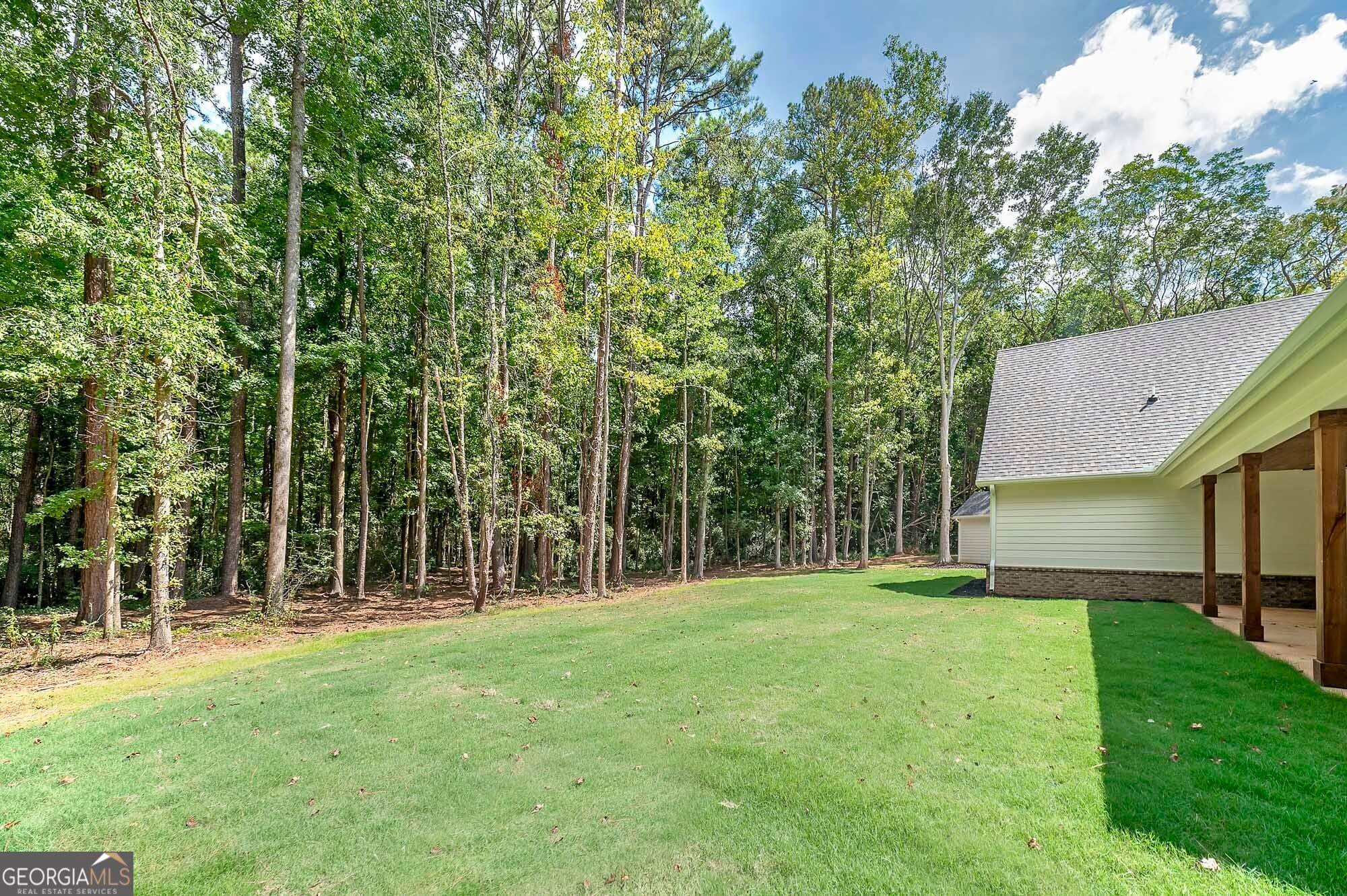 5 bedroom, 3.5 bathroom, 3,890 sq ft single family residence for sale at 164 Henderson Mill, Mansfield, GA 30055 — photo 6
