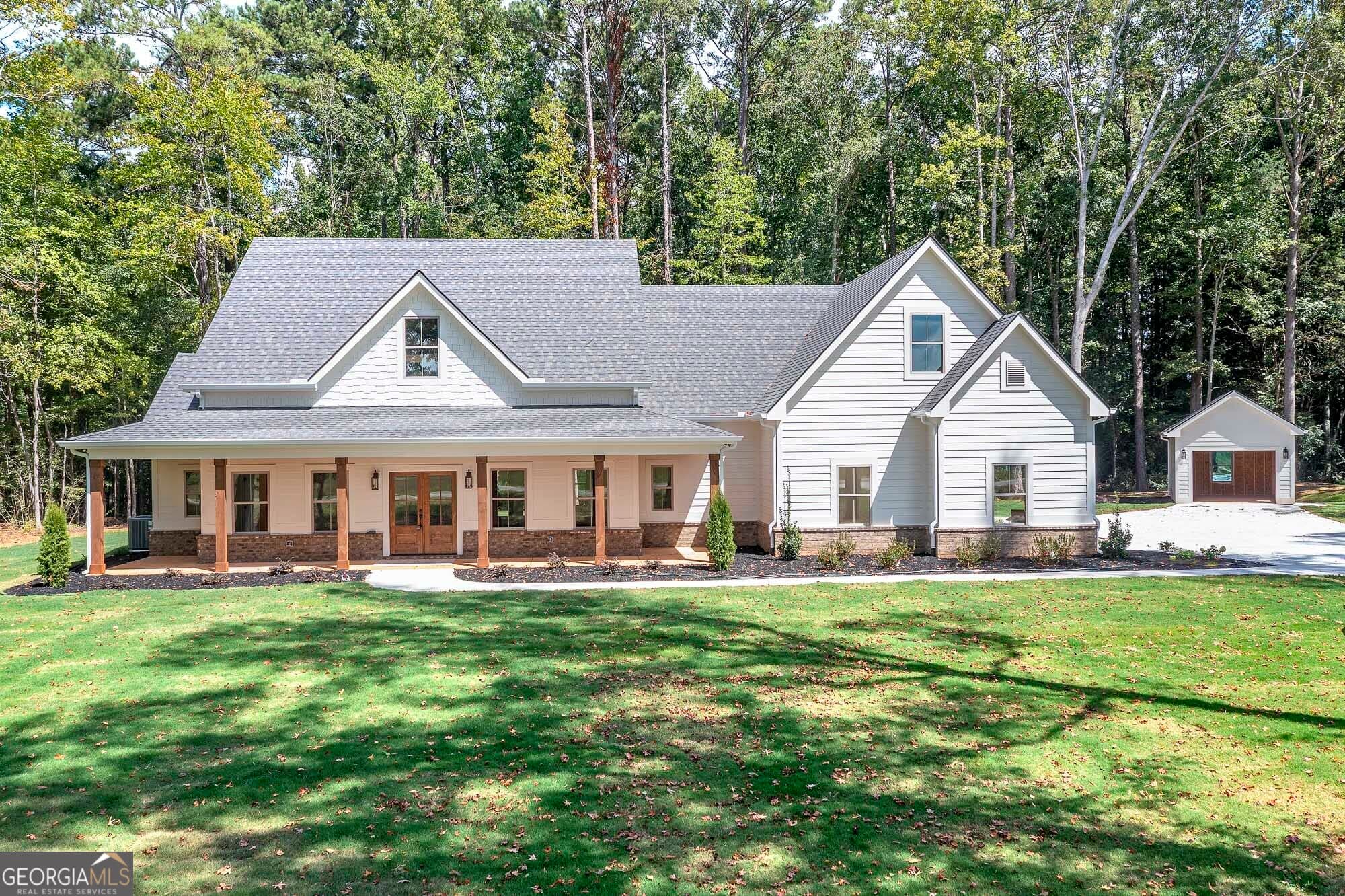 5 bedroom, 3.5 bathroom, 3,890 sq ft single family residence for sale at 164 Henderson Mill, Mansfield, GA 30055 — photo 1 of 62