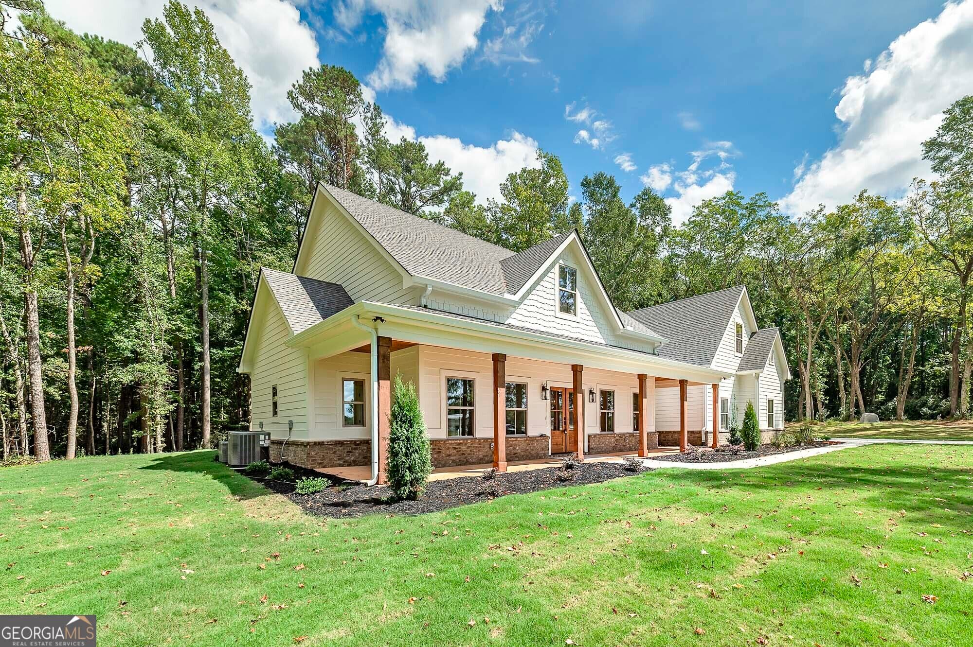 5 bedroom, 3.5 bathroom, 3,890 sq ft single family residence for sale at 164 Henderson Mill, Mansfield, GA 30055 — photo 4