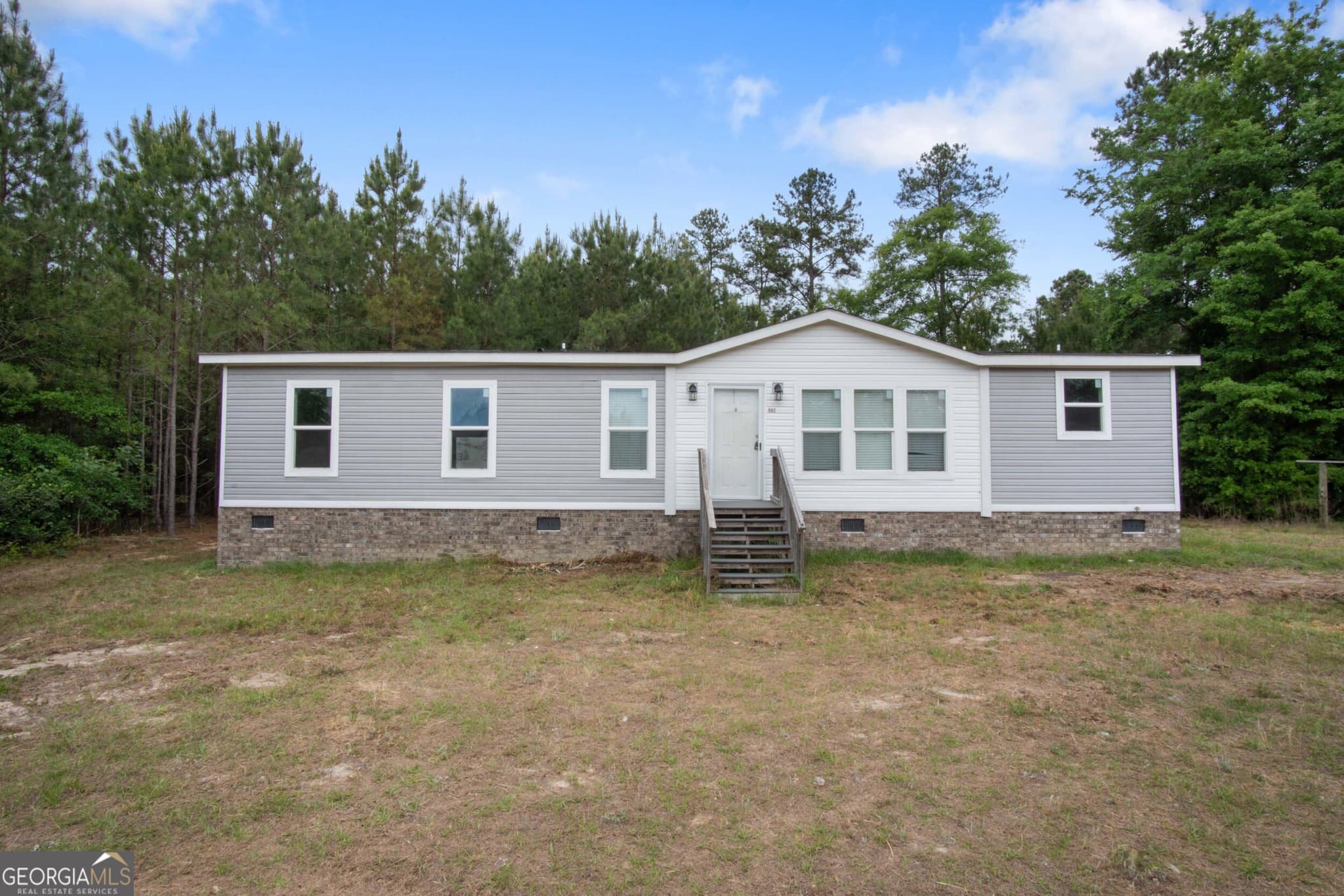 3 bedroom, 2 bathroom, 1,456 sq ft manufactured home,single family residence for sale at 562 Boll Weevil Road, Waynesboro, GA 30830 — photo 3