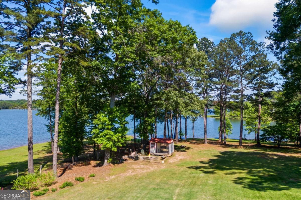 7 bedroom, 5.5 bathroom, 9,700 sq ft single family residence for sale at 160 Evans Drive, Bogart, GA 30622 — photo 6