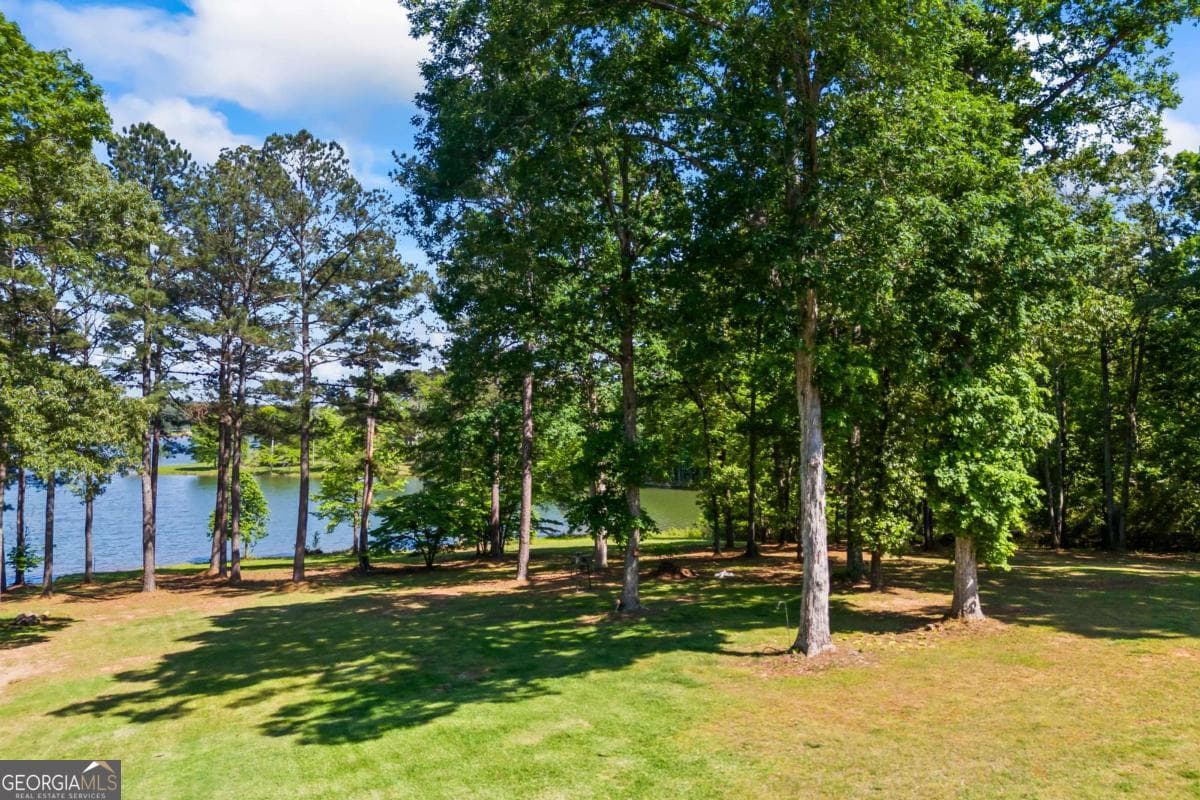 7 bedroom, 5.5 bathroom, 9,700 sq ft single family residence for sale at 160 Evans Drive, Bogart, GA 30622 — photo 7