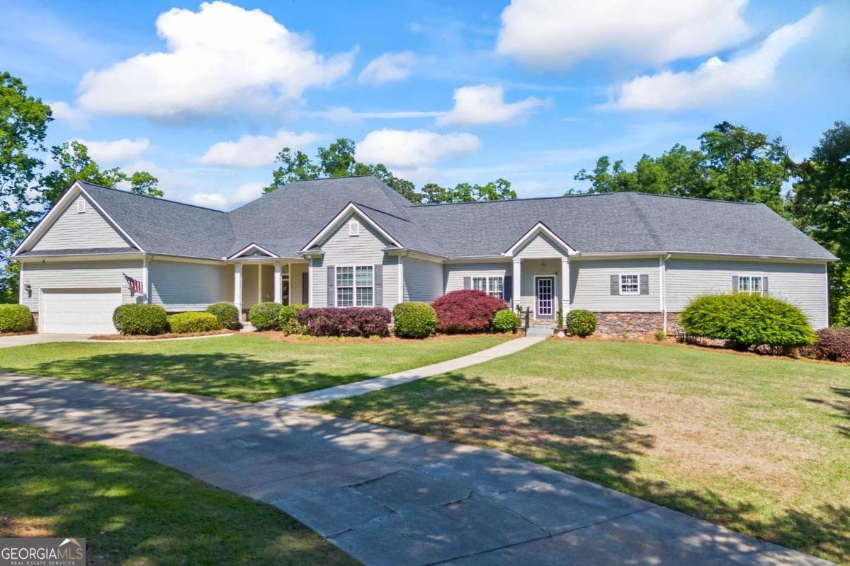 7 bedroom, 5.5 bathroom, 9,700 sq ft single family residence for sale at 160 Evans Drive, Bogart, GA 30622 — photo 3