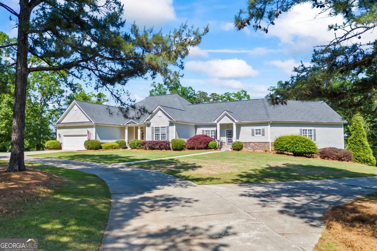 7 bedroom, 5.5 bathroom, 9,700 sq ft single family residence for sale at 160 Evans Drive, Bogart, GA 30622 — photo 1 of 130