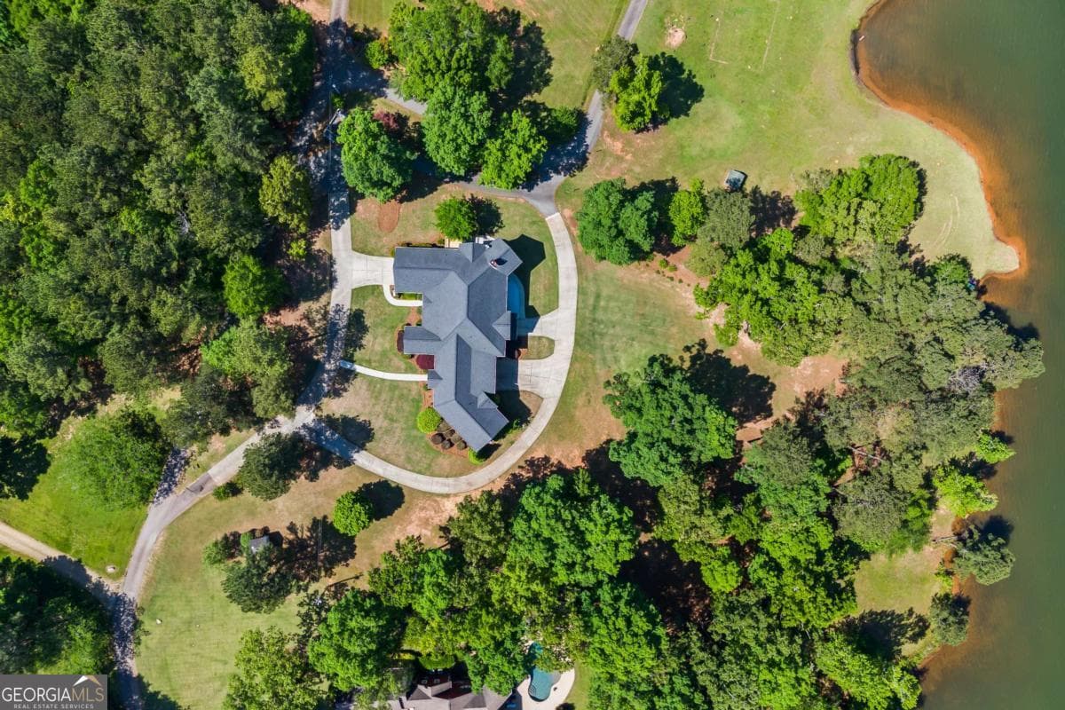7 bedroom, 5.5 bathroom, 9,700 sq ft single family residence for sale at 160 Evans Drive, Bogart, GA 30622 — photo 9