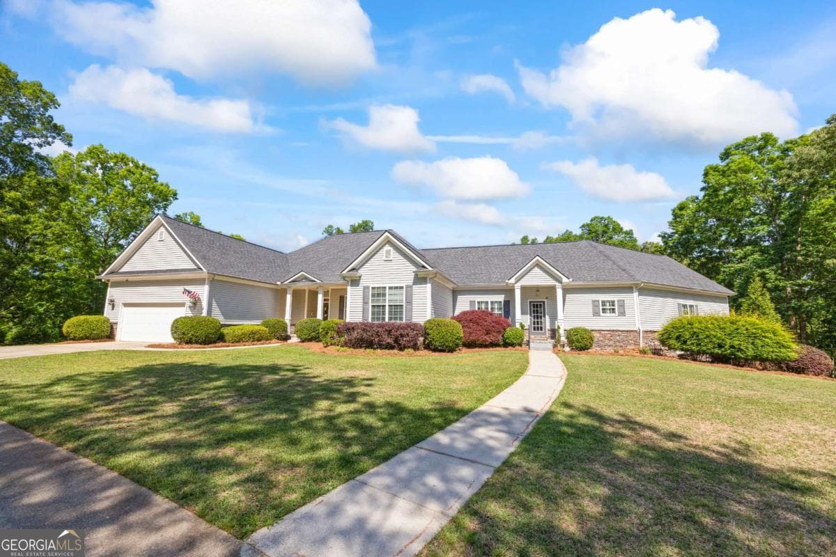 7 bedroom, 5.5 bathroom, 9,700 sq ft single family residence for sale at 160 Evans Drive, Bogart, GA 30622 — photo 10