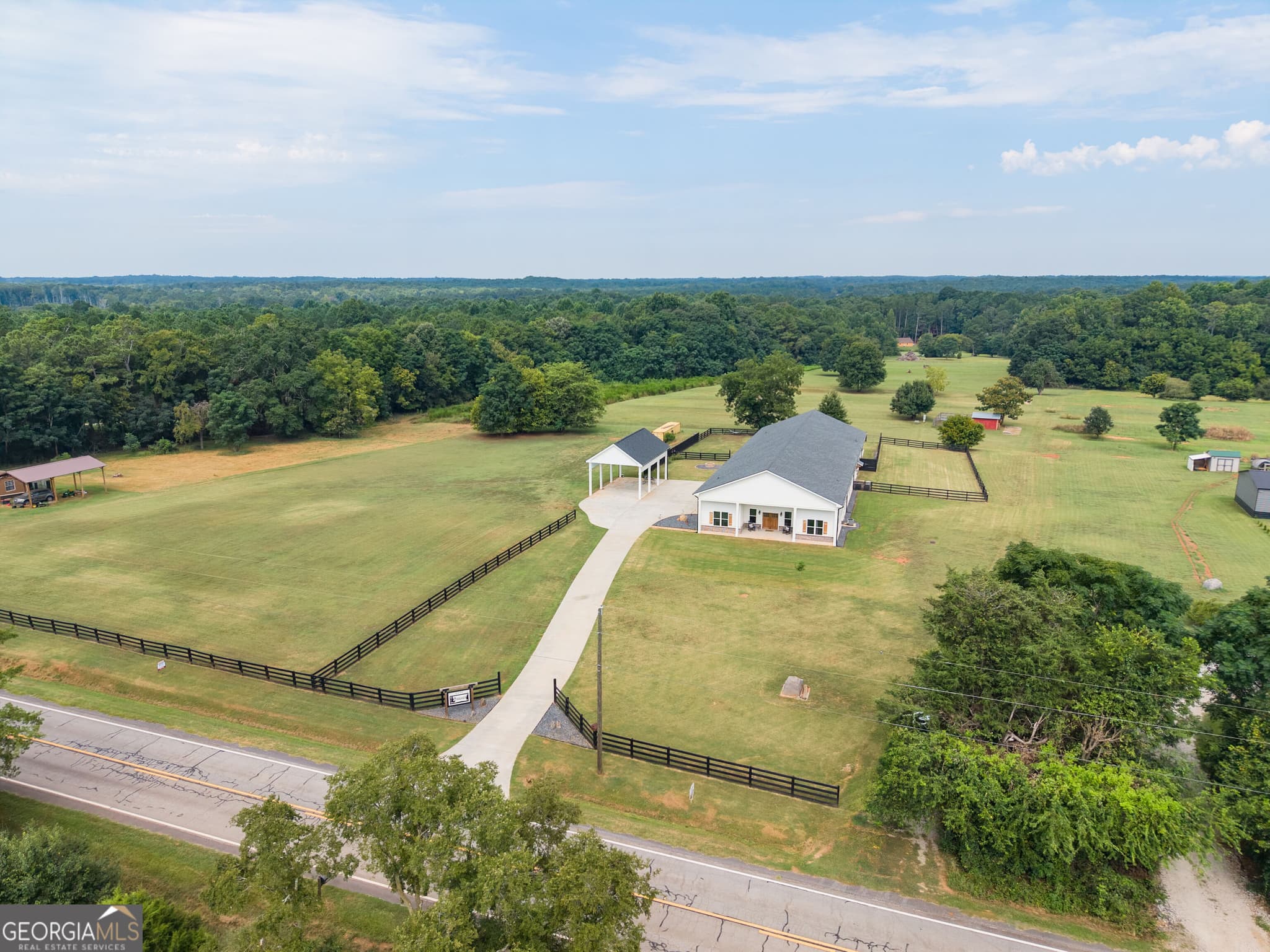 4 bedroom, 3.5 bathroom, 4,900 sq ft single family residence for sale at 3441 Seven Islands Road, Madison, GA 30650 — photo 5