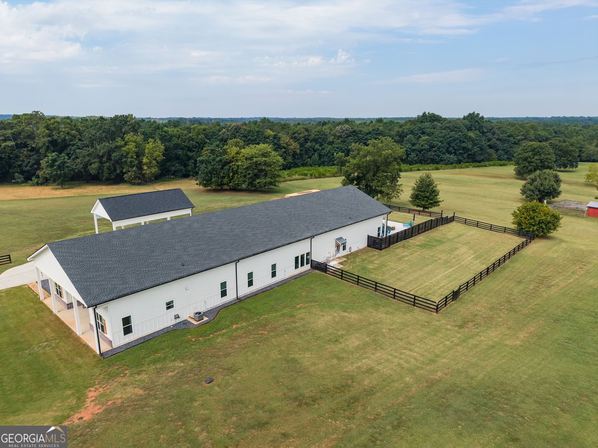 4 bedroom, 3.5 bathroom, 4,900 sq ft single family residence for sale at 3441 Seven Islands Road, Madison, GA 30650 — photo 4