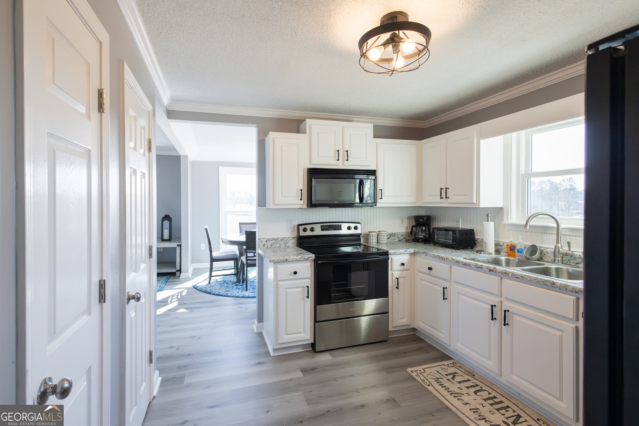 3 bedroom, 2.5 bathroom, 1,768 sq ft single family residence for sale at 1578 Edsel Senn Road, Rockledge, GA 30454 — photo 3