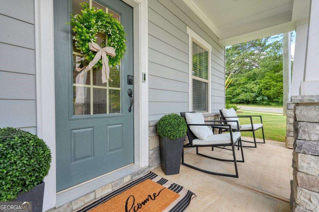 3 bedroom, 2.5 bathroom, 2,064 sq ft single family residence for sale at 100 Grove View Road, Woodstock, GA 30189 — photo 2
