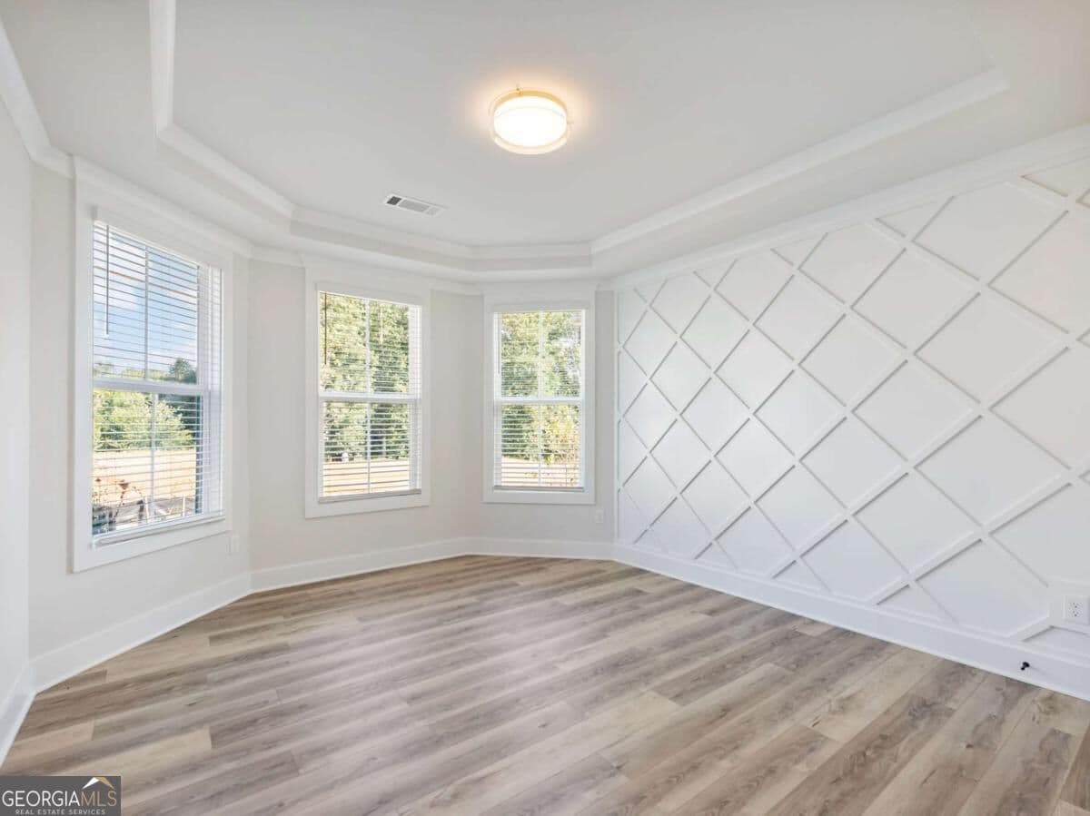 5 bedroom, 4 bathroom, 3,243 sq ft single family residence for sale at 4260 Hosch Reserve Drive, Buford, GA 30519 — photo 6