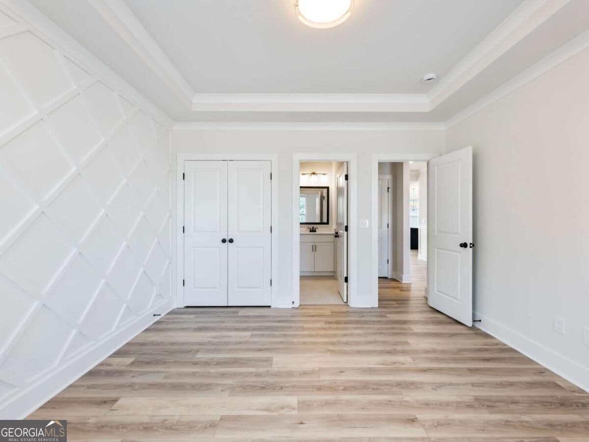 5 bedroom, 4 bathroom, 3,243 sq ft single family residence for sale at 4260 Hosch Reserve Drive, Buford, GA 30519 — photo 7