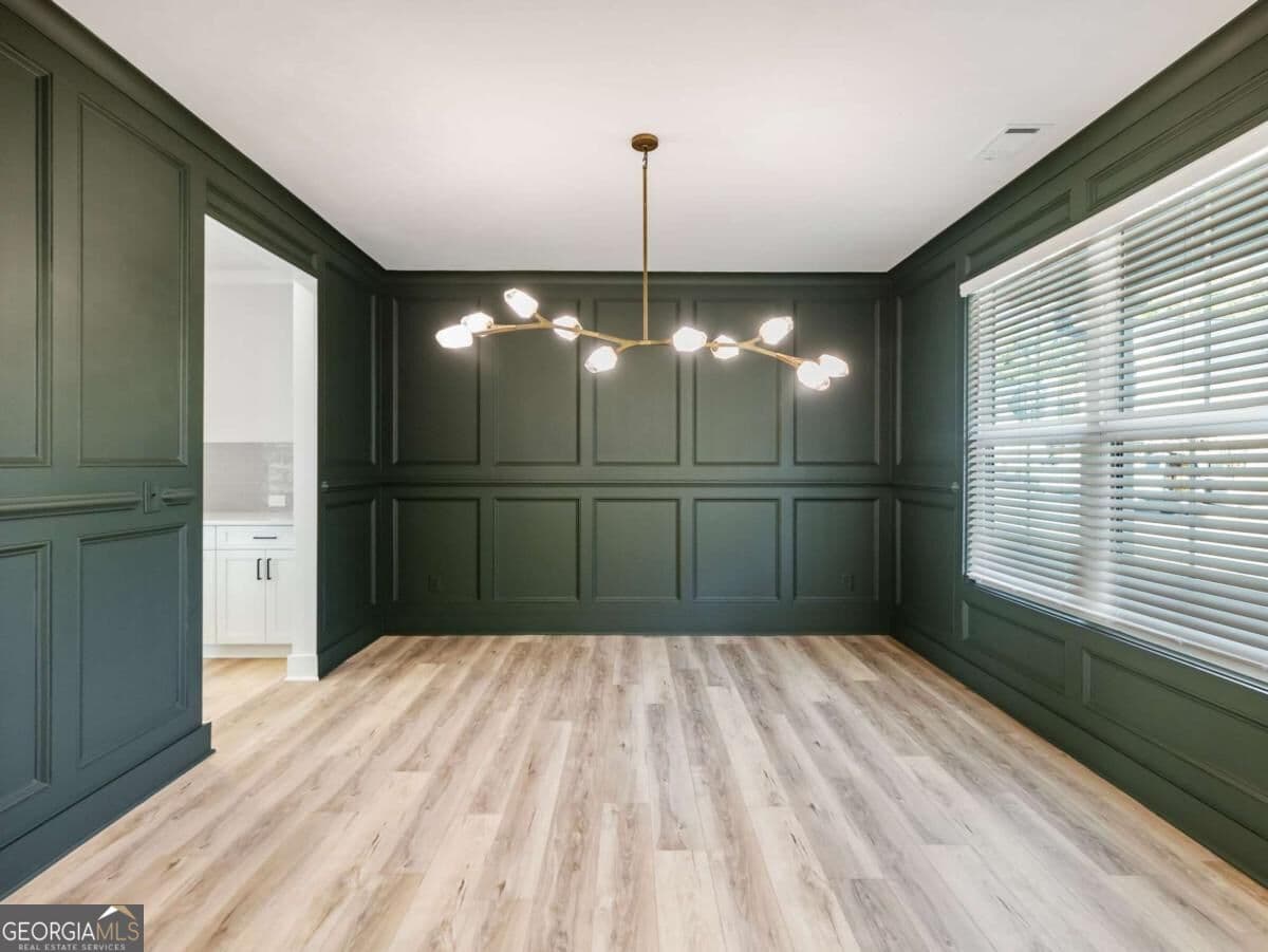 5 bedroom, 4 bathroom, 3,243 sq ft single family residence for sale at 4260 Hosch Reserve Drive, Buford, GA 30519 — photo 3