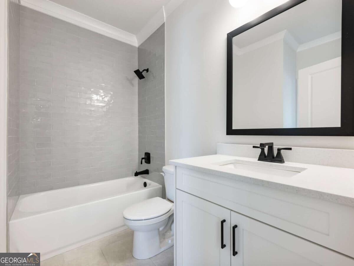 5 bedroom, 4 bathroom, 3,243 sq ft single family residence for sale at 4260 Hosch Reserve Drive, Buford, GA 30519 — photo 10