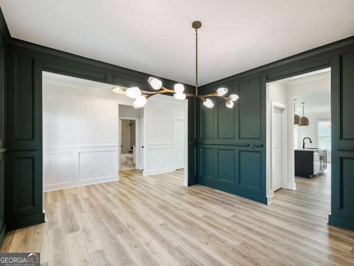 5 bedroom, 4 bathroom, 3,243 sq ft single family residence for sale at 4260 Hosch Reserve Drive, Buford, GA 30519 — photo 4