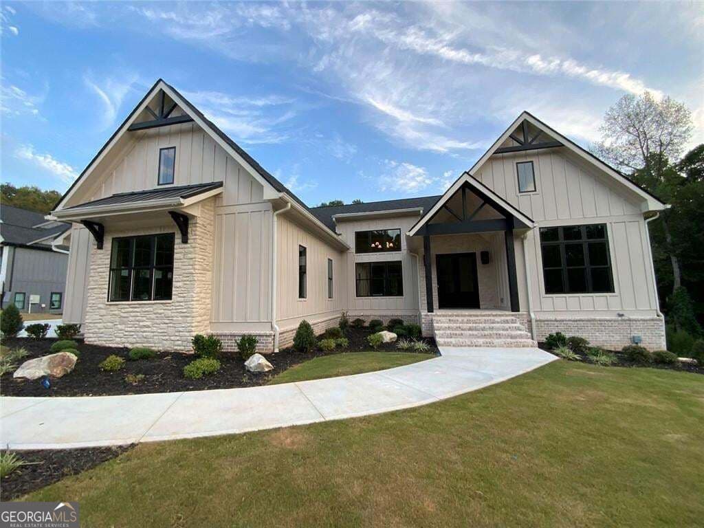 5 bedroom, 5.5 bathroom, 4,505 sq ft single family residence for sale at 2468 Rockbridge Road, Conyers, GA 30012 — photo 2