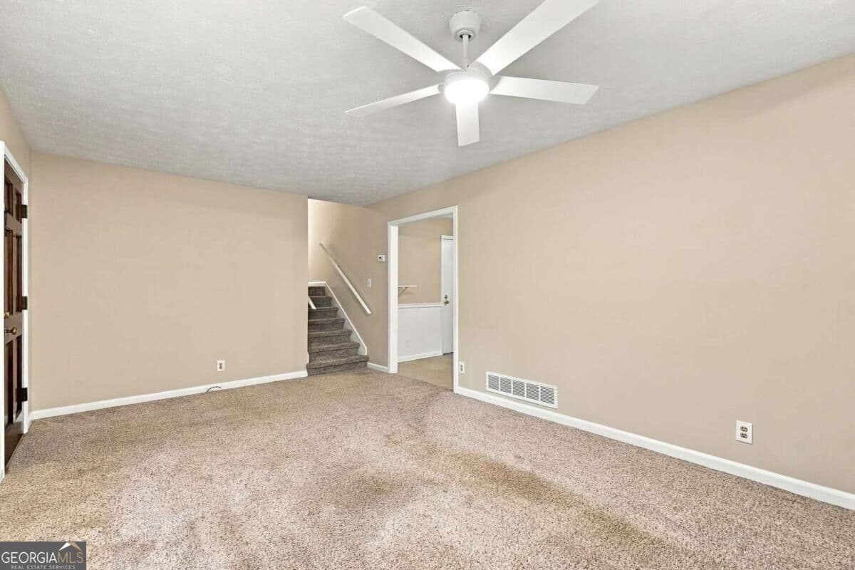 4 bedroom, 2 bathroom, 1,585 sq ft single family residence for sale at 3450 Lake Drive, Lawrenceville, GA 30044 — photo 6